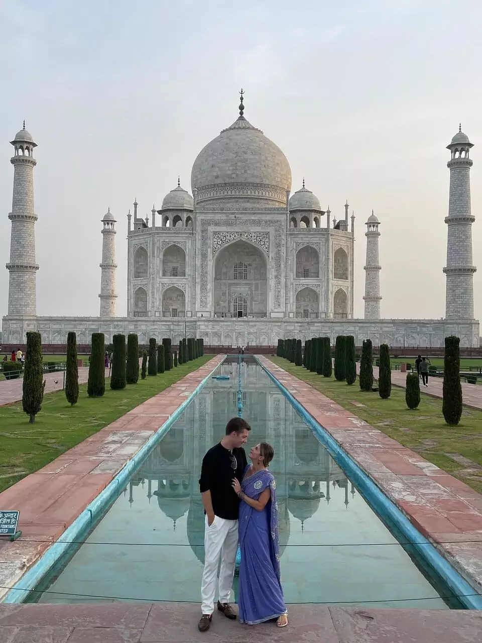 Namaste Private Driver India customers posing in front of the Taj Mahal