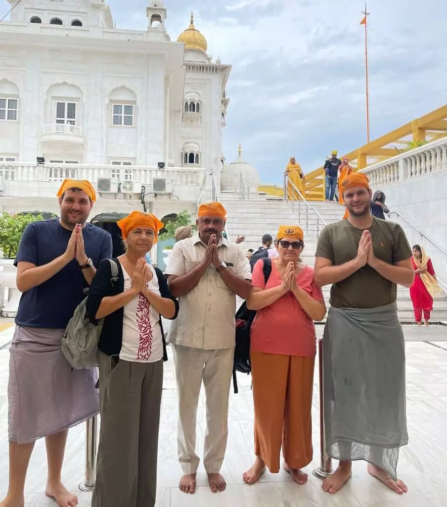 Namaste Private Driver India customers posing in temple